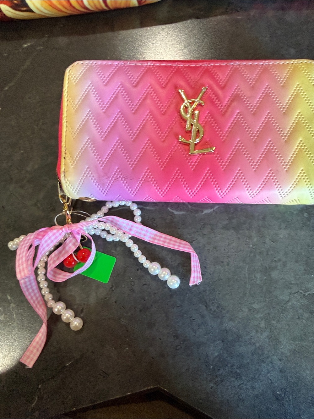 multi color wallet with YSL letters on front